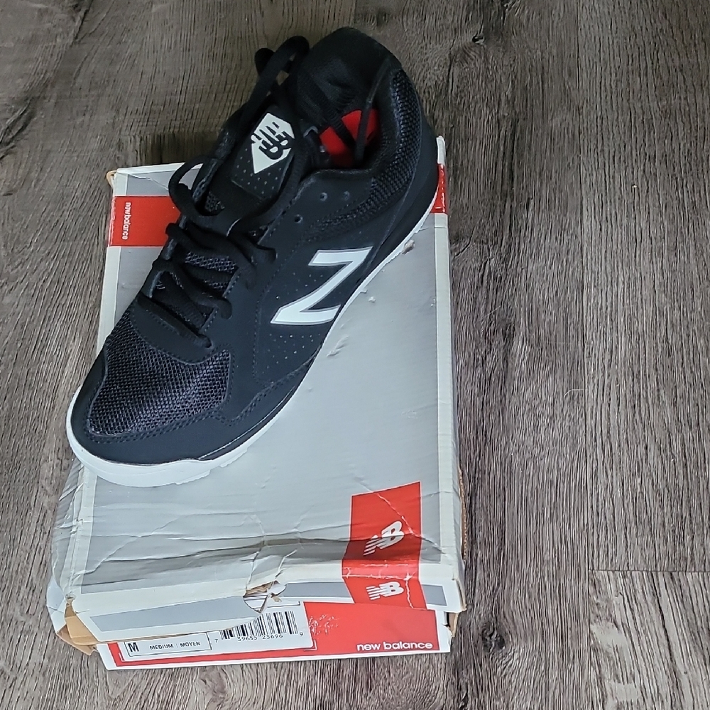 New Balance Black and White Sneakers with Mesh Upper